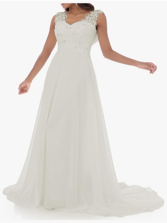 Chic Nation Dresses & Skirts - A timeless ivory dress with delicate lace appliqué and subtle beadwork on the bo